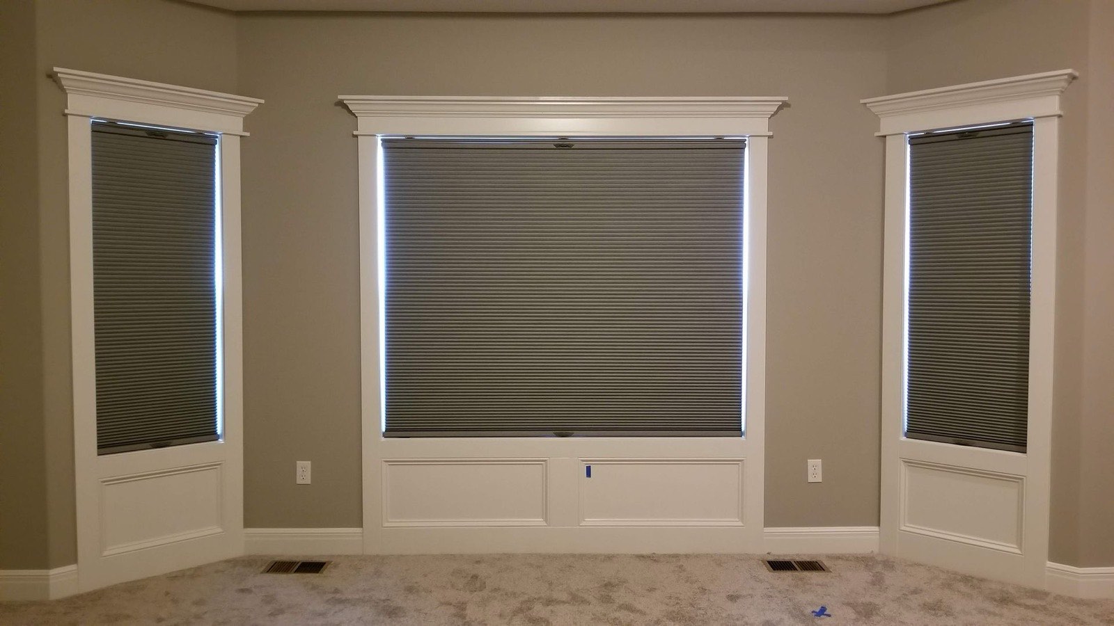 Cellular shades in a bay window