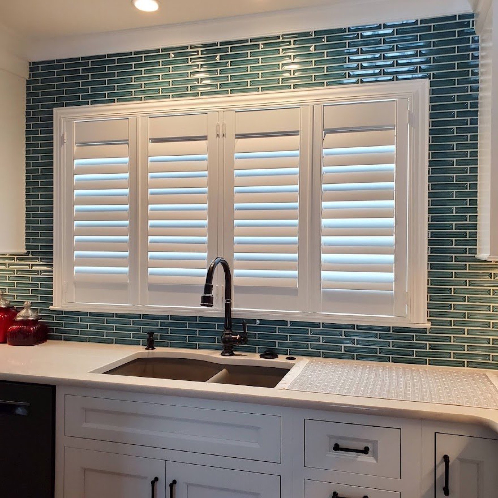 Shutters over a kitchen sink window